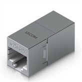 Compact, inline RJ45 coupler with shielding for ethernet cable extension.